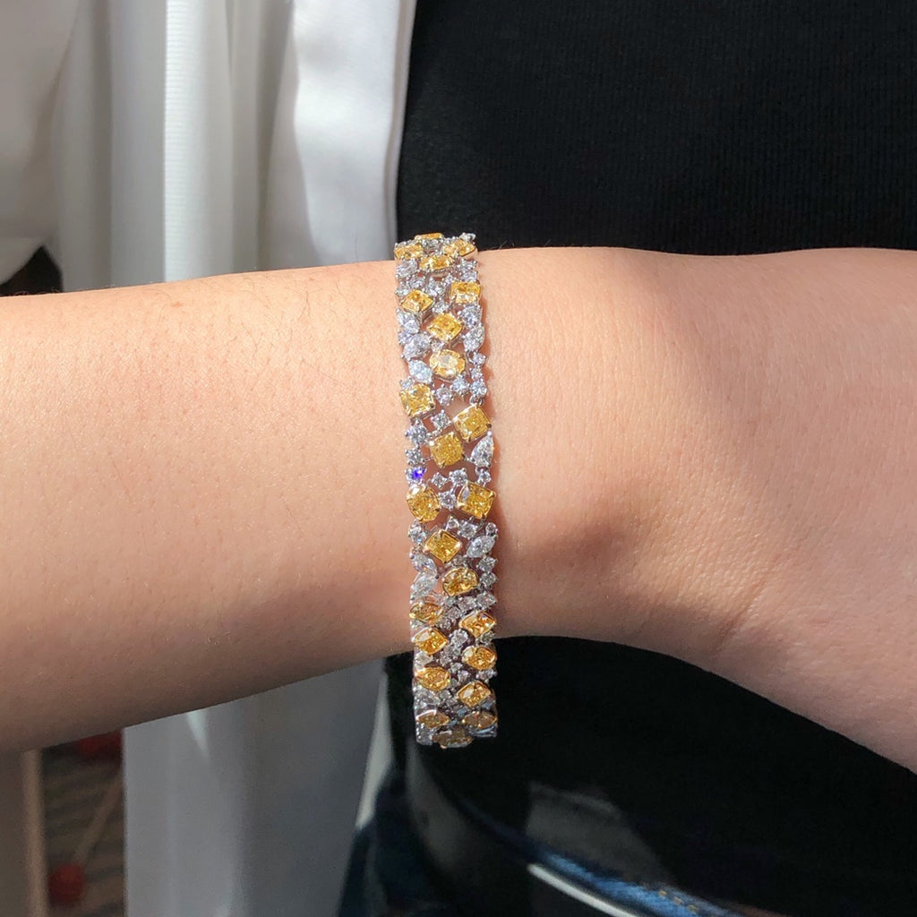 “15 carat diamond bracelet with yellow and white diamonds in 18k gold”