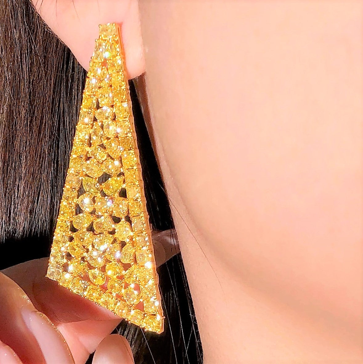 16.90ct fancy yellow diamond dangle earrings in 18k yellow gold