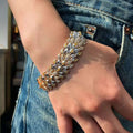 18K Yellow Diamond Feather Bracelet, Intricate Feather Design, Luxurious Yellow Diamonds