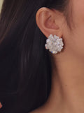 18K gold floral earrings adorned with pavé natural diamonds