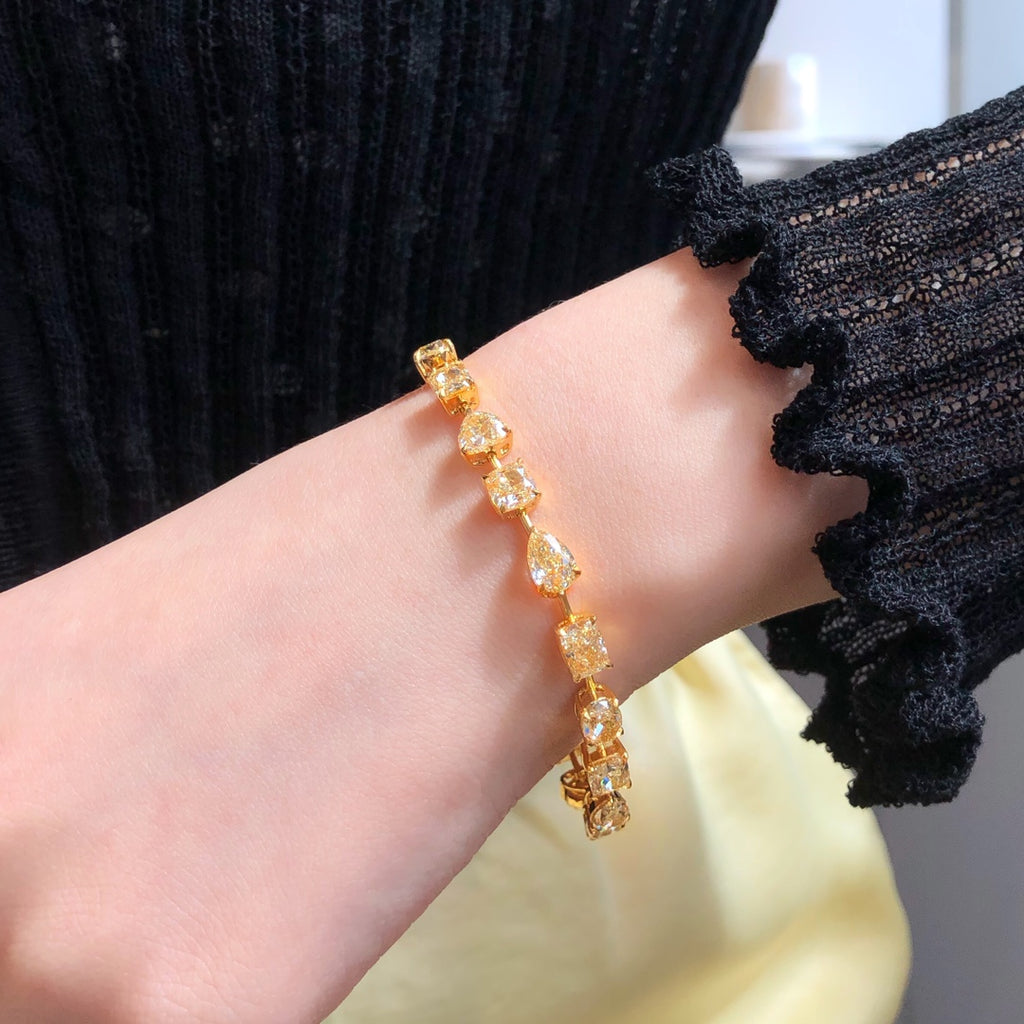  19.50ct Fancy Yellow Diamond Tennis Bracelet in 18K Yellow Gold, Multi-Shape Cuts