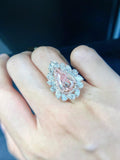GIA 4ct Fancy Light Pinkish Brown Pear Diamond Halo Ring