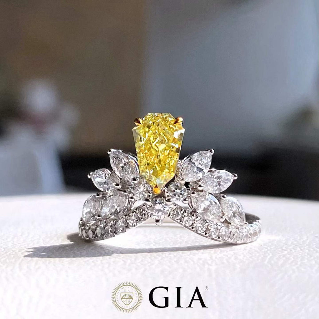 1.02 Carat Fancy Yellow Diamond Ring with 0.49 Carat Side Stones
