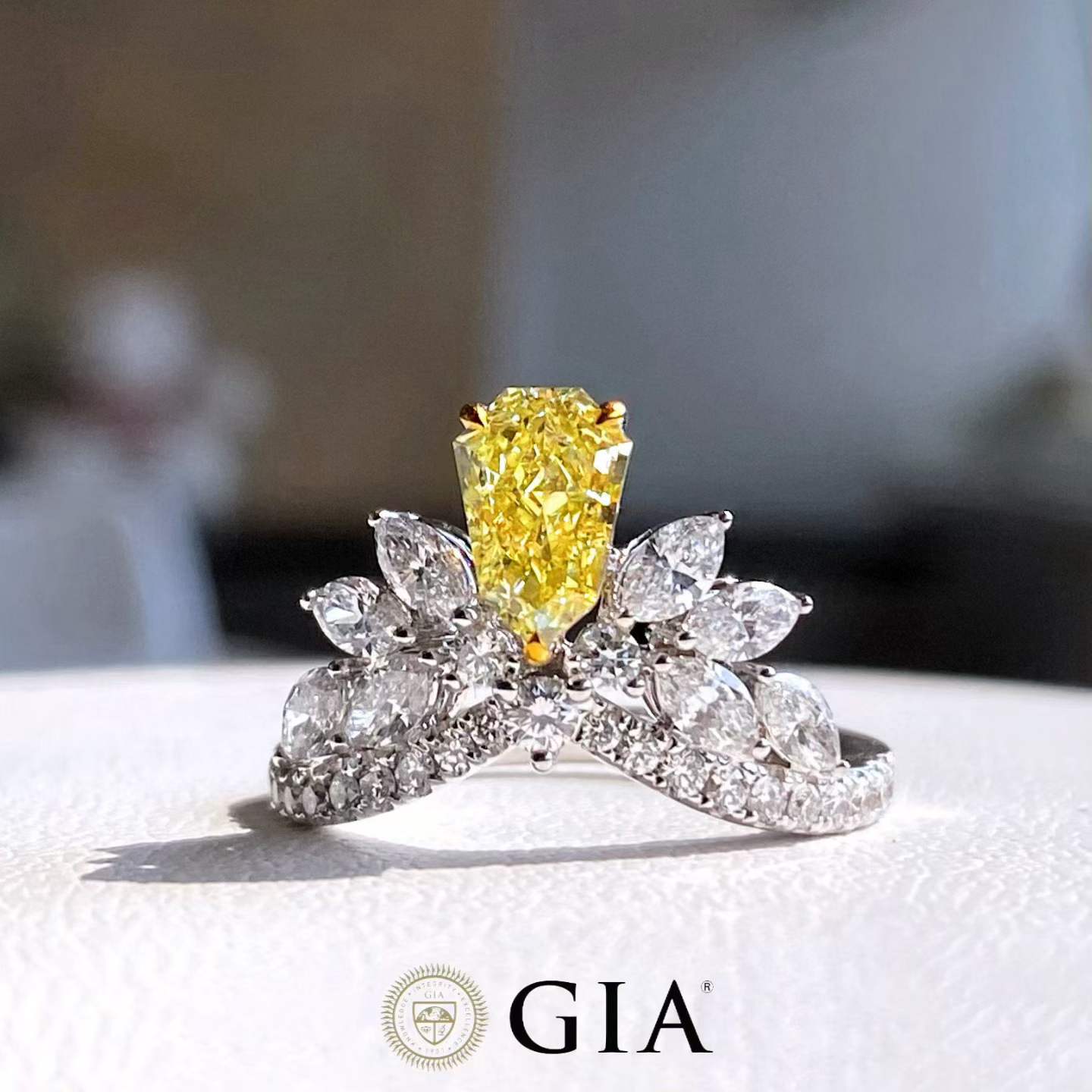 1.02 Carat Fancy Yellow Diamond Ring with 0.49 Carat Side Stones