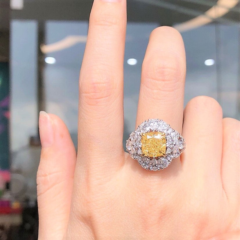 Elegant yellow and white diamond engagement ring by Eze Jewelry