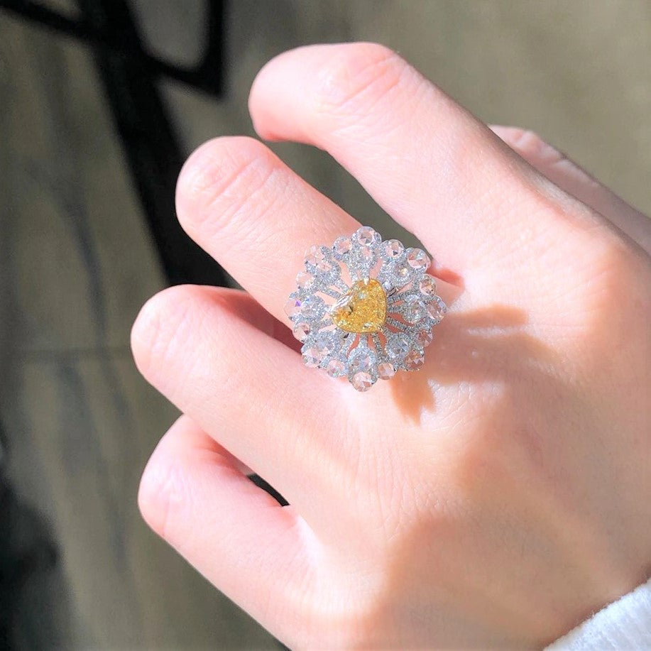 Heart-shaped fancy yellow diamond ring in 18k white and yellow gold