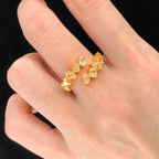 “2.28ct yellow diamond bypass ring with mixed cuts in 18k gold”