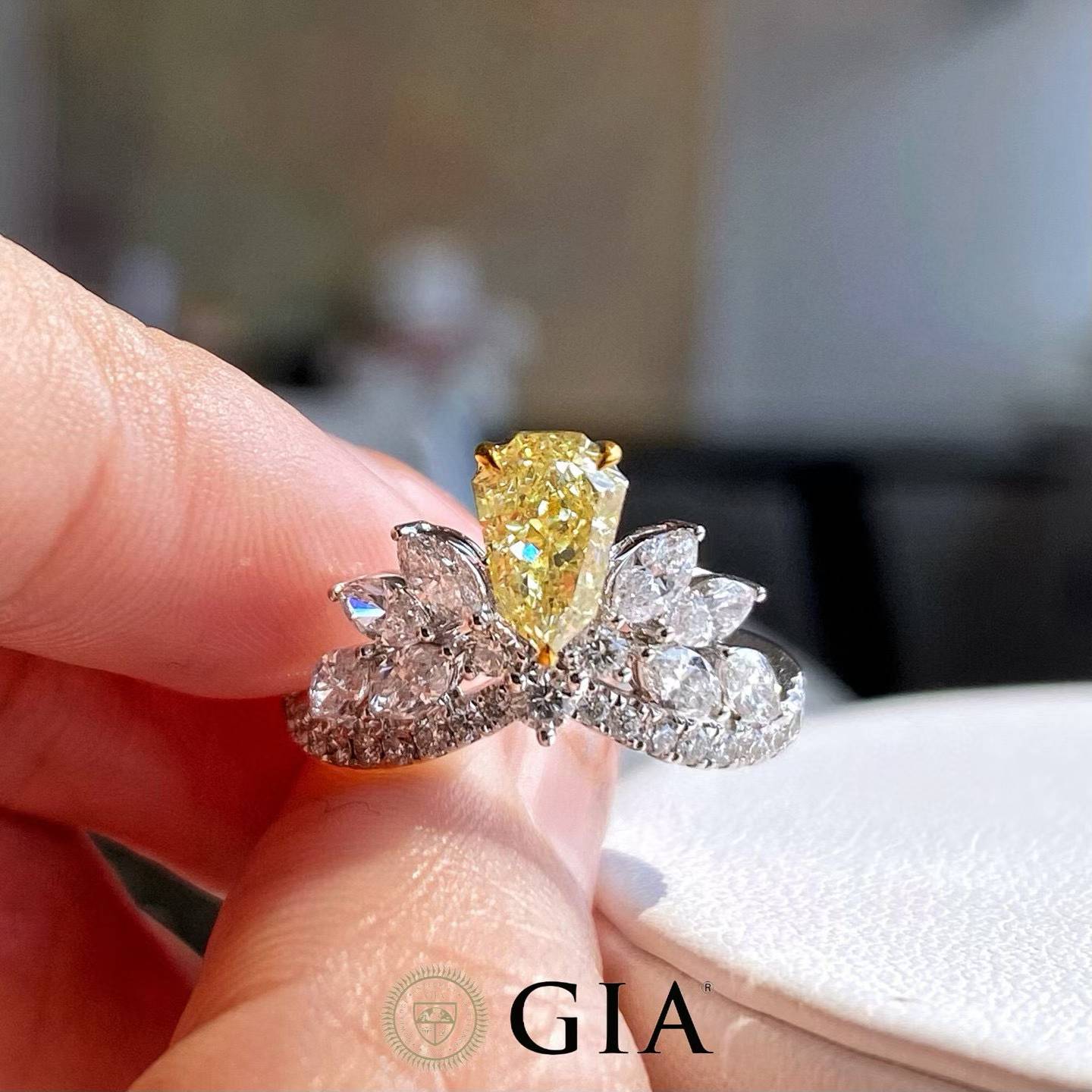 1.02 Carat Fancy Yellow Diamond Ring with 0.49 Carat Side Stones