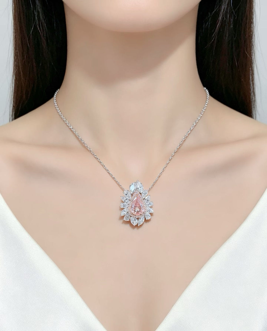 GIA 4ct Fancy Light Pinkish Brown Pear Diamond Halo Ring
