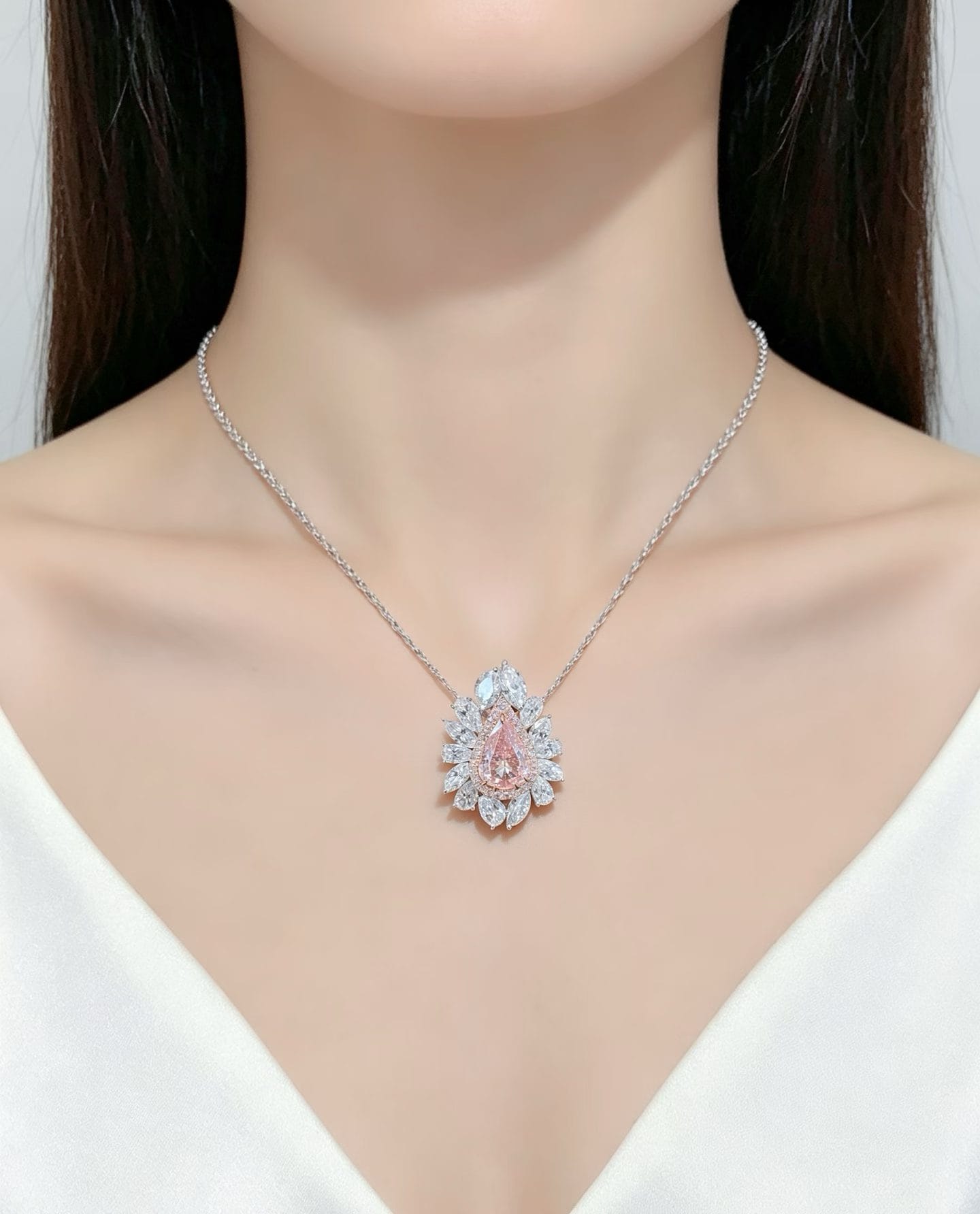 GIA 4ct Fancy Light Pinkish Brown Pear Diamond Halo Ring