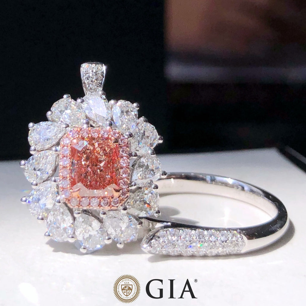 Fancy Pink Diamond & White Pear Halo Ring