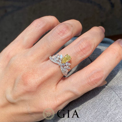 1.02 Carat Fancy Yellow Diamond Ring with 0.49 Carat Side Stones