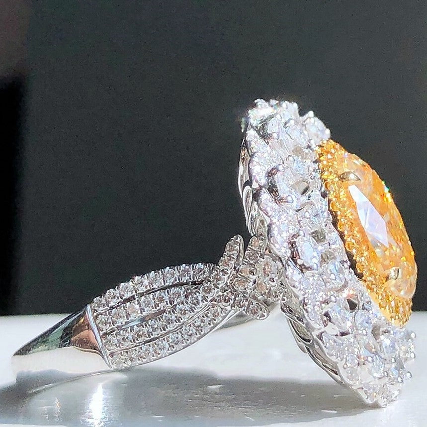 Anel de noivado de diamante oval amarelo extravagante certificado pela GIA de 4 quilates