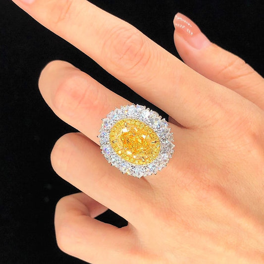 Anel de noivado de diamante oval amarelo extravagante certificado pela GIA de 10 quilates