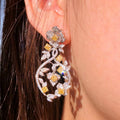 “4.46ct fancy yellow and white diamond drop earrings in 18k gold”