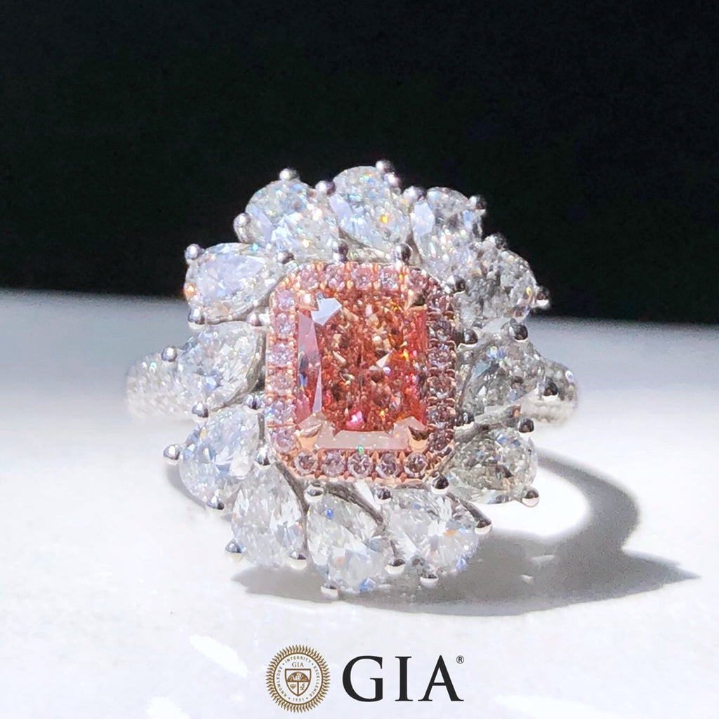 Fancy Pink Diamond & White Pear Halo Ring