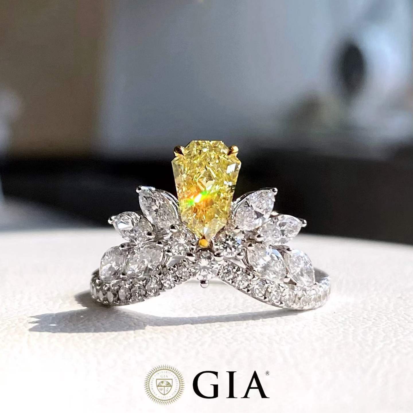 1.02 Carat Fancy Yellow Diamond Ring with 0.49 Carat Side Stones