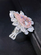 GIA 4ct Fancy Light Pinkish Brown Pear Diamond Halo Ring