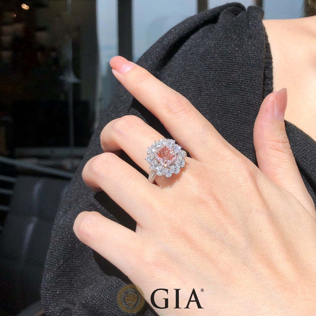 Fancy Pink Diamond & White Pear Halo Ring