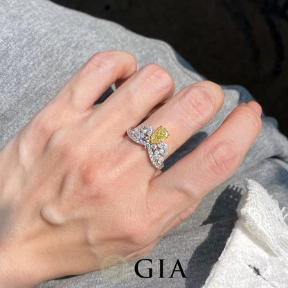 1.02 Carat Fancy Yellow Diamond Ring with 0.49 Carat Side Stones