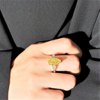  5 carat fancy yellow pear-shaped diamond ring with 0.60ct white diamonds, GIA certified, set in 18K gold.