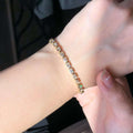  6.27ct White Diamond Tennis Bracelet, Bezel Set, Emerald Cut, Yellow Gold
