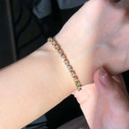  6.27ct White Diamond Tennis Bracelet, Bezel Set, Emerald Cut, Yellow Gold
