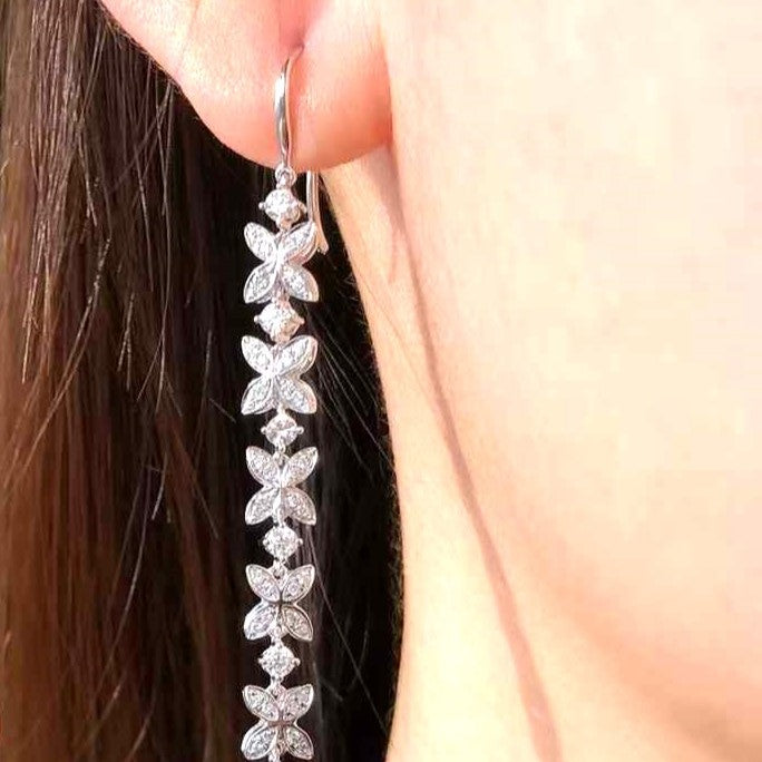 Boucles d’oreilles pendantes en diamant blanc 0,80ct en or blanc