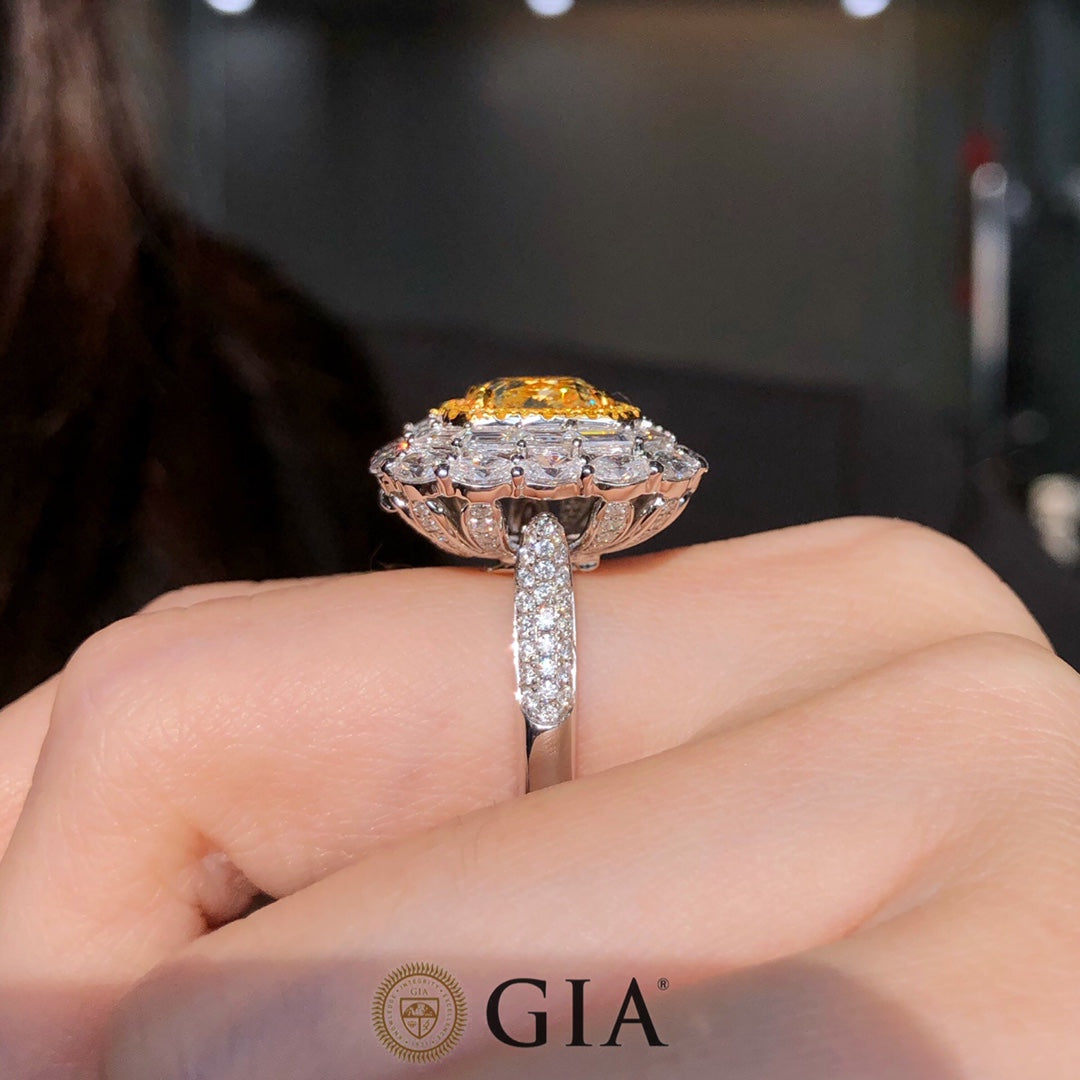 Close-up of 4.52ct Fancy Light Yellow Diamond and 3.55ct white diamonds in 18k white gold engagement ring
