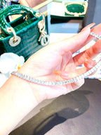 Close up of GIA Certified 30.60 Carat Emerald Cut Diamond Necklace in White Gold