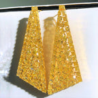 “Elegant fancy yellow diamond earrings from Eze Jewelry”