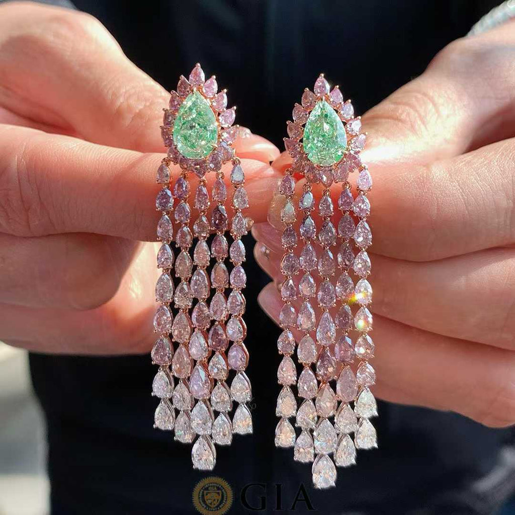 Elegant statement drop earrings featuring rare green diamonds and natural diamonds