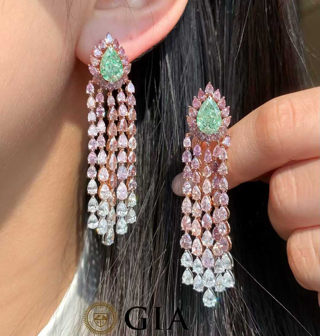 GIA-certified green diamond drop earrings in 18K white and pink gold