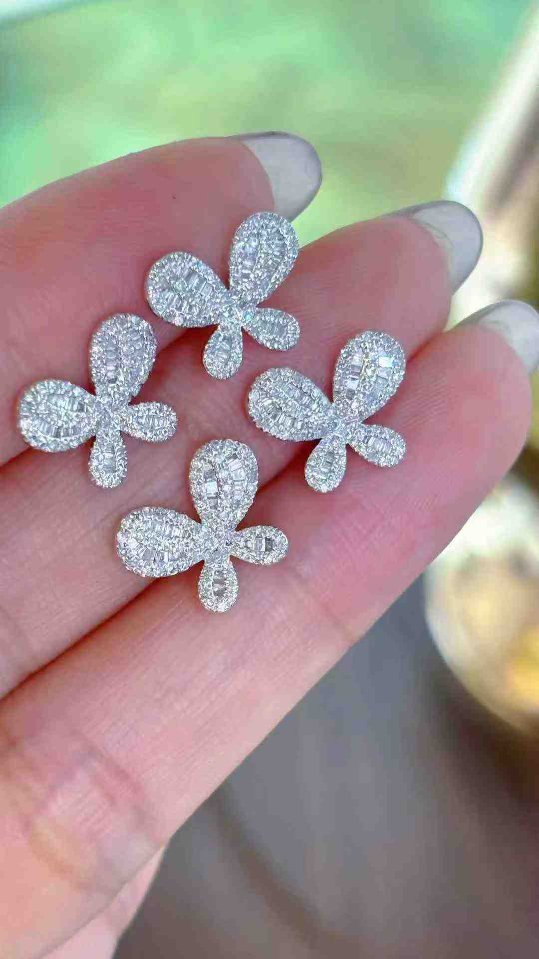 Diamond Stud Earrings – Butterfly-Inspired Design in 18k Gold