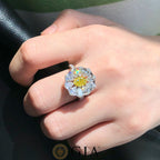 “Luxury yellow diamond engagement ring with white diamond halo”
