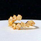 “Modern bypass ring with fancy yellow diamonds in solid gold”