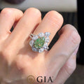 Pear cut green diamond ring with white halo in 18k white gold, 2.52ct center stone