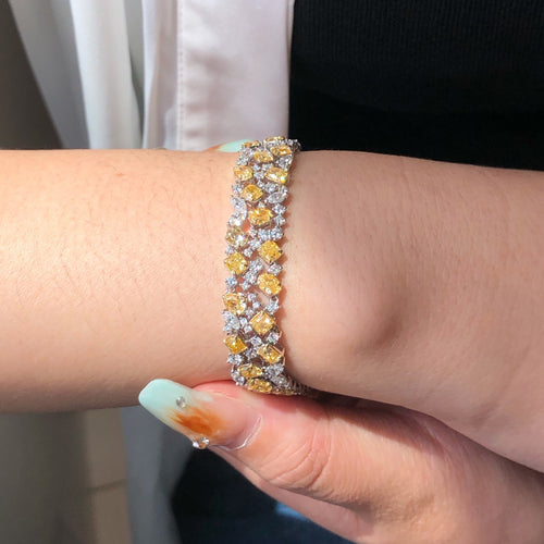 “Two-tone gold bracelet with 15ct mixed diamonds”