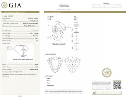 1.02 Carat Fancy Yellow Diamond Ring with 0.49 Carat Side Stones