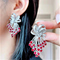 18k White Gold Ruby Diamond Earrings